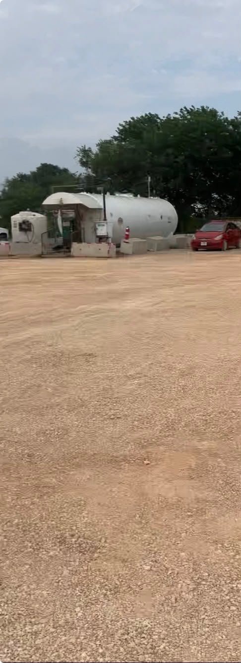 Finished gravel parking area at a commercial facility