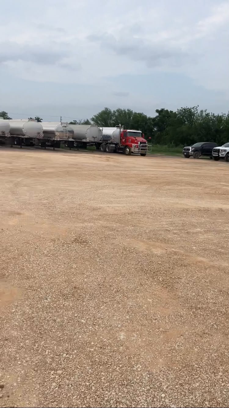 Improved gravel lot designed for heavy truck traffic