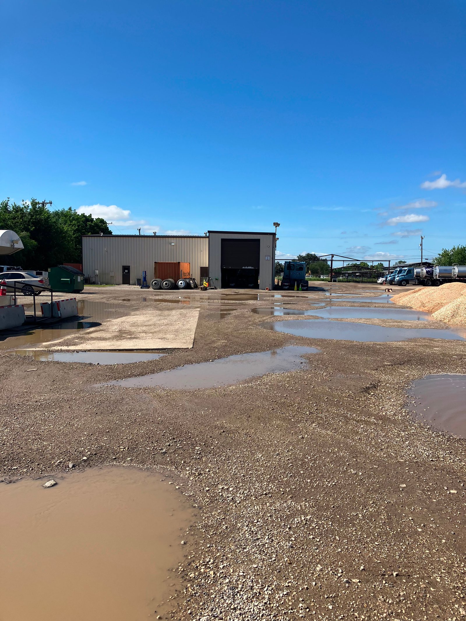 Commercial truck yard during parking lot grading work